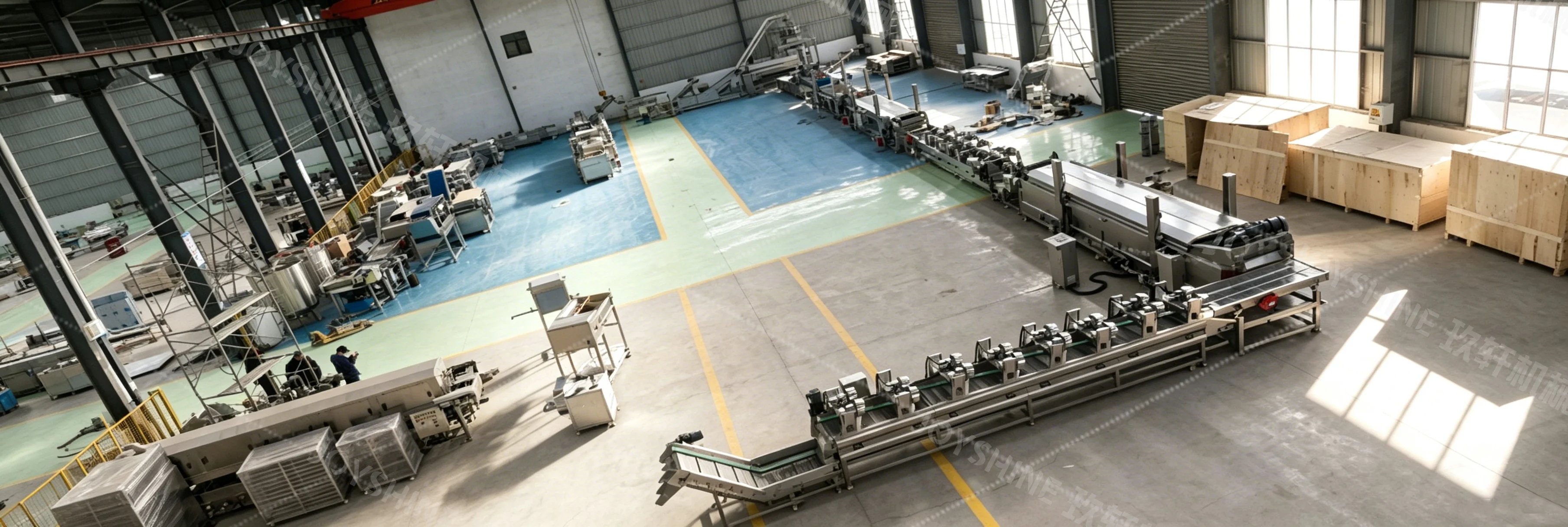 Automatic potato chips production line assembled in the factory workshop